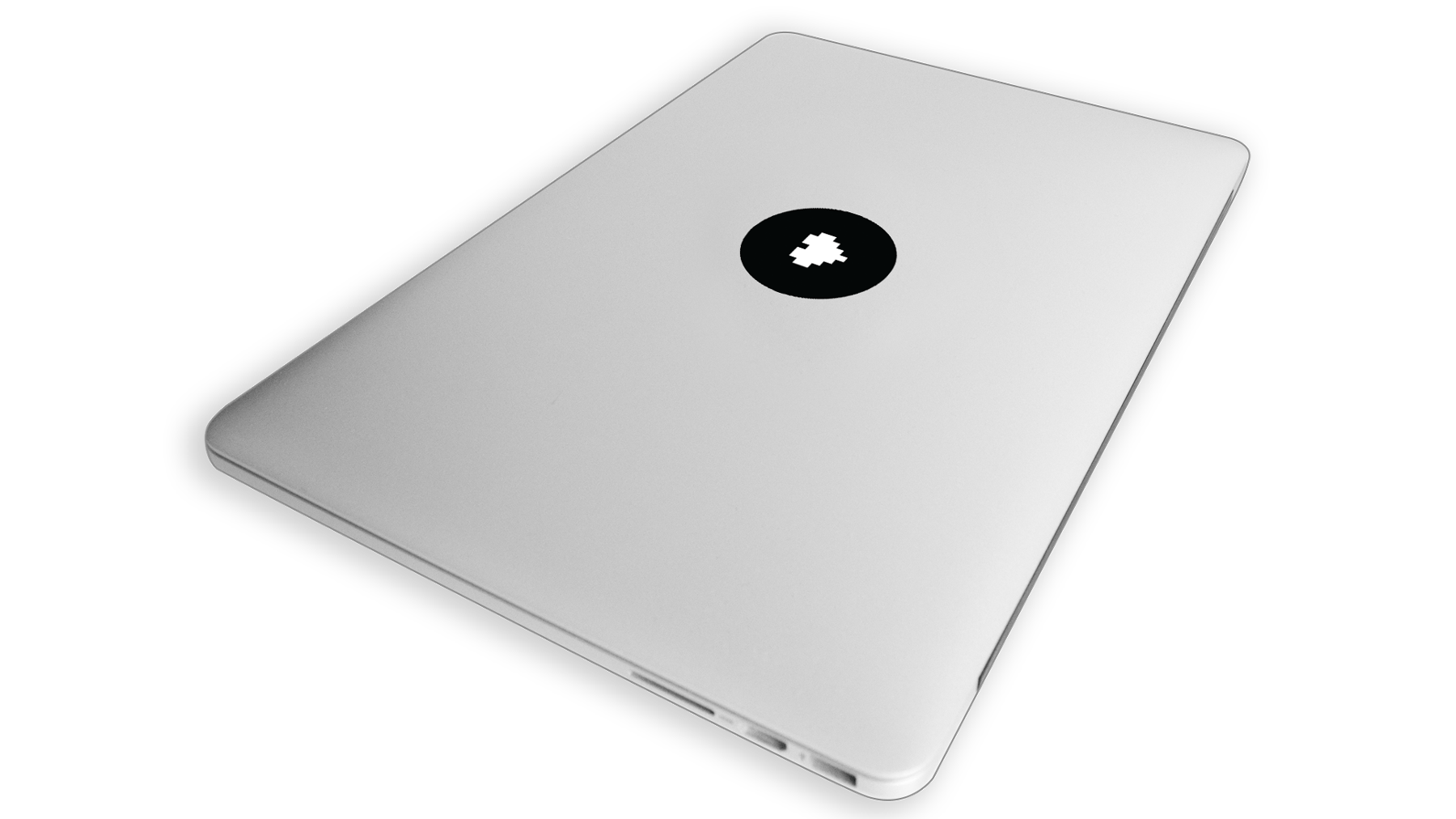 A MacBook with a Stickerlicious sticker on it
