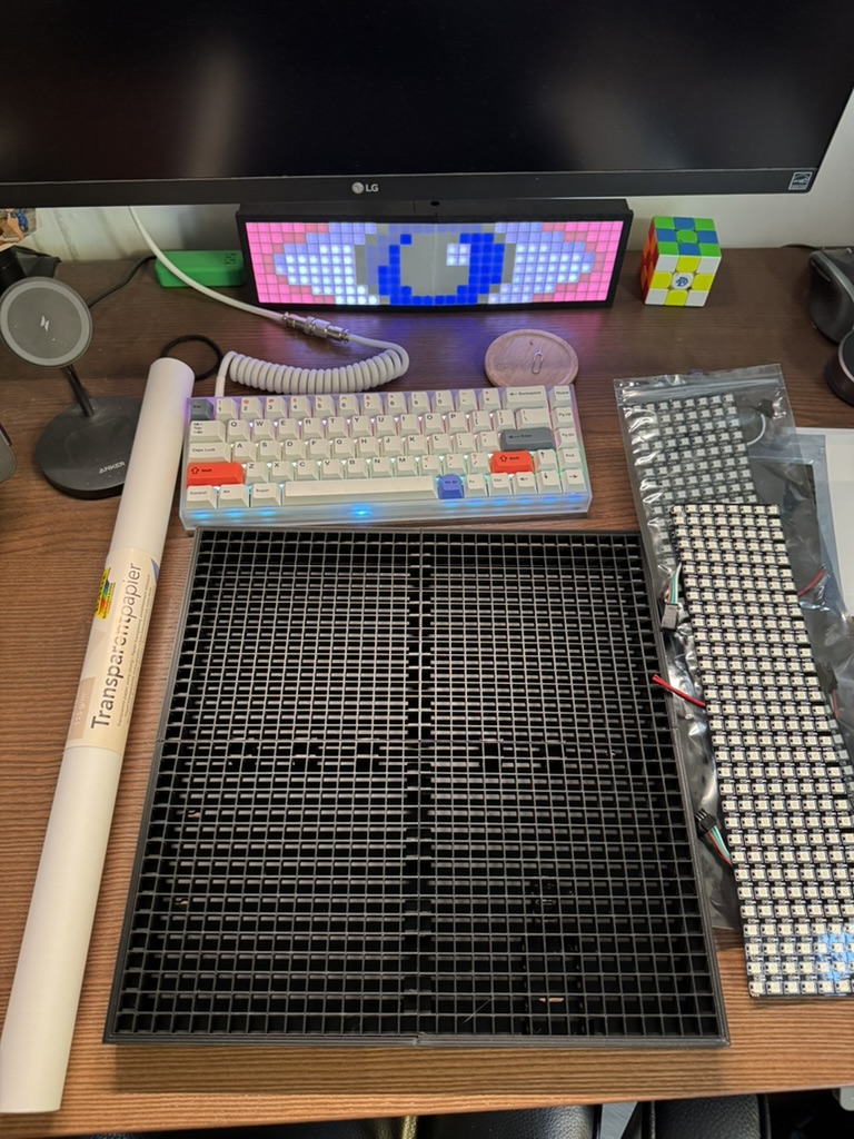 All components for the upgraded 32x32 LED display laid out on the desk.